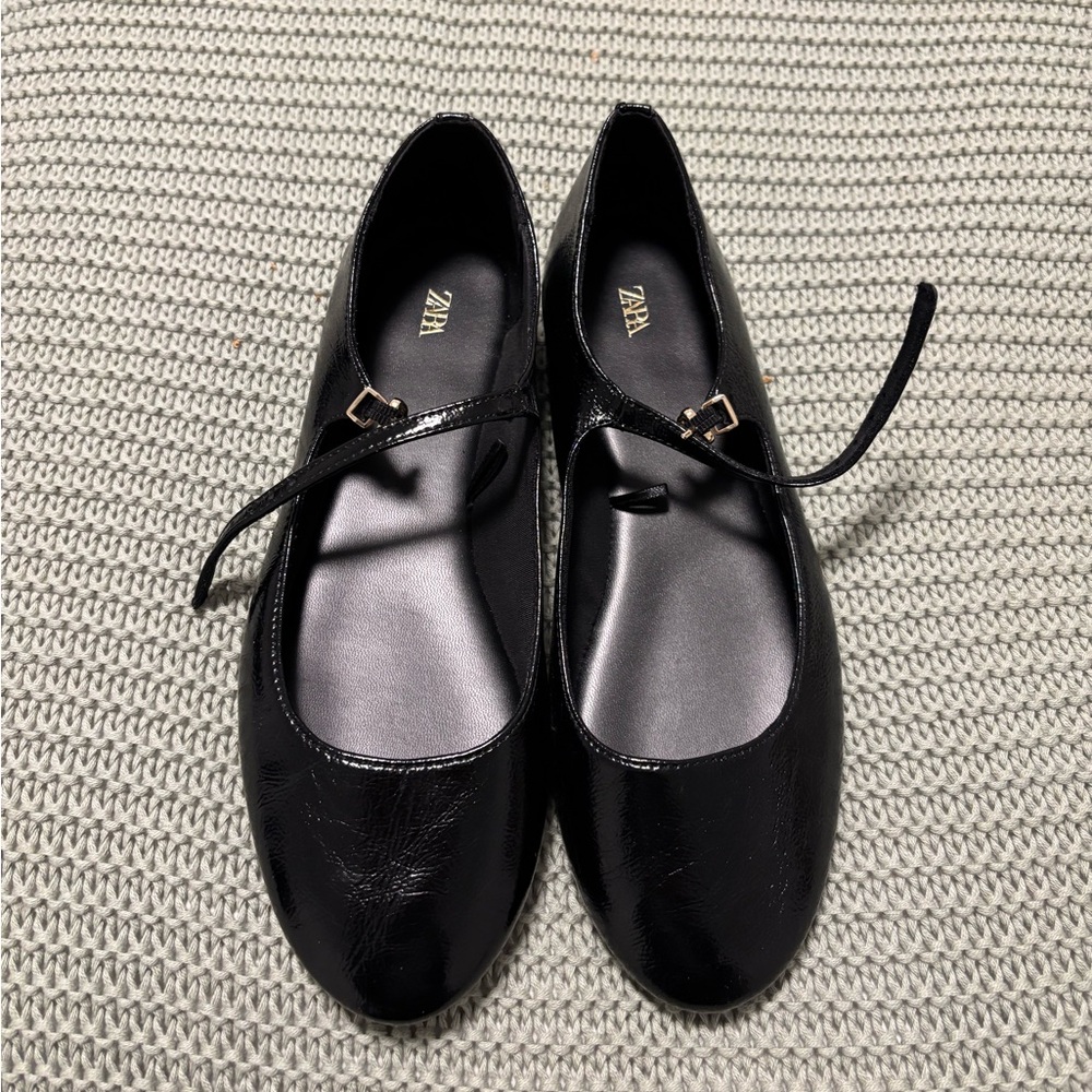 Black flats with strap